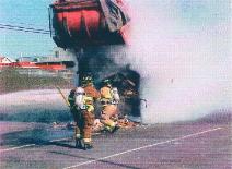 The fire is finally out on this trash truck in 2000 at the 80th Street Marina Lot.