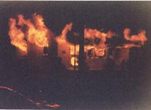 Fully envolved house fire on 200/77 in 1993