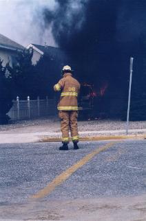 A late model Suburban on fire in 1996 in the driveway of a house on the beach block of 106th Street.