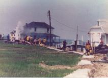 Structure fire in the Grassy Sound. in the early 1990's. Firefighters were going to lay hose for almost a mile, but then decided to take out the Marine unit and suppress the fire like that.