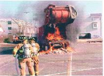 Fully envolved trash truck fire at the 80th St Marina in 2000